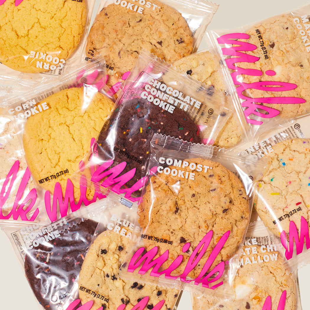overhead shot of a spread of individually wrapped assorted cookies.